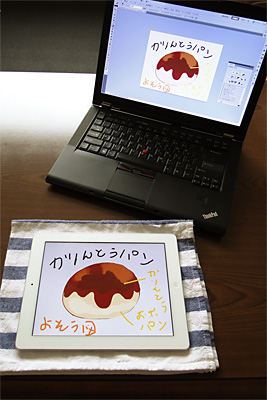 iPad2とPC。Adobe Eazel for Photoshopを使ってiPad2で描いた絵をPCに送信したところです